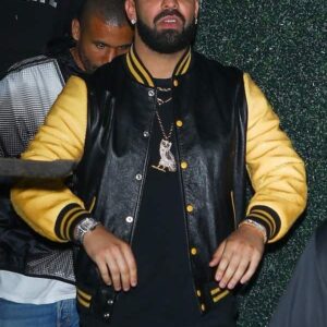 Musician Aubrey Drake Graham Wearing a Black Bomber Jacket which have yellow sleeves