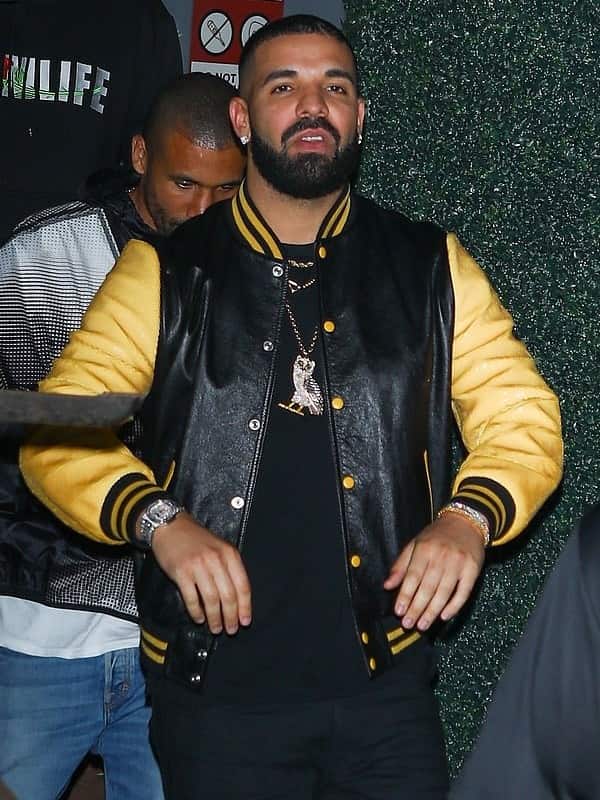 Musician Aubrey Drake Graham Wearing a Black Bomber Jacket which have yellow sleeves