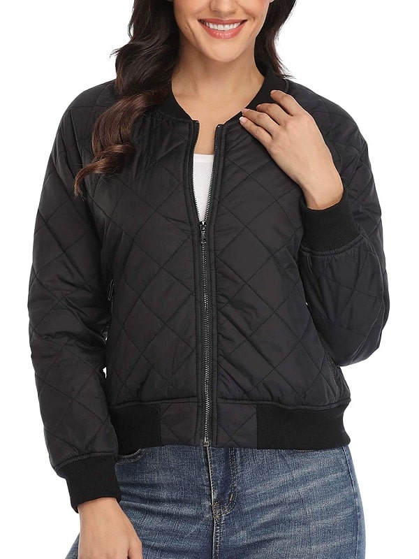 A Young Girl Wearing A Black Color Quilted Design Jacket