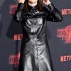 Millie Bobby Wearing Black Leather Long Top in Stranger Things Event