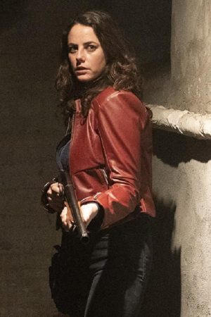 Kaya Scodelario Wearing Maroon Leather Jacket In Resident Evil: Welcome to Raccoon City as Claire Redfield