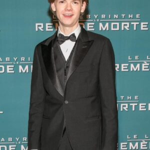 Thomas Brodie-Sangster at an event for Maze Runner The Death Cure Wearing Black Tuxedo suit