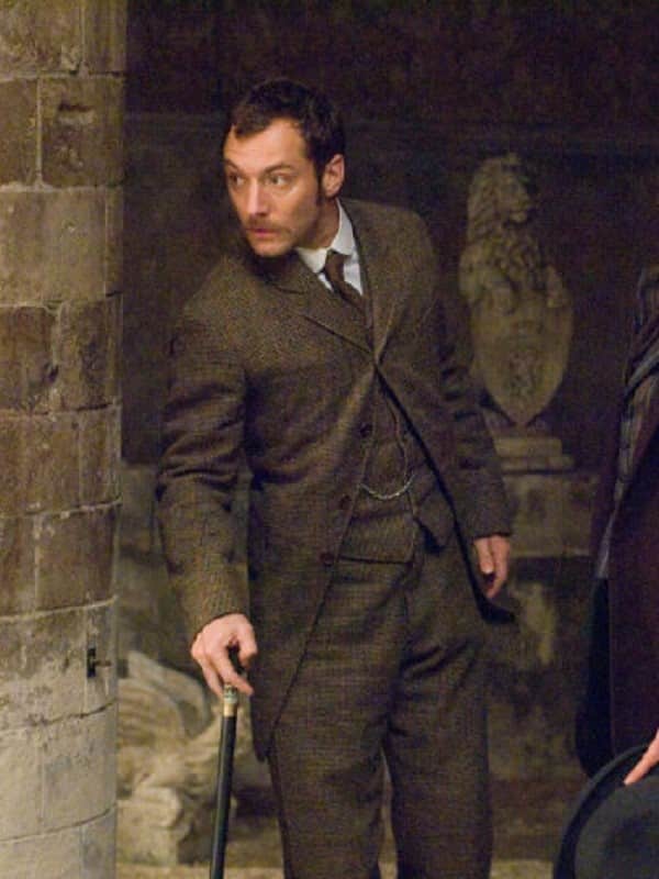 Actor Jude Law Wearing Gray Coat In Sherlock Holmes Movie as Dr. John Watson