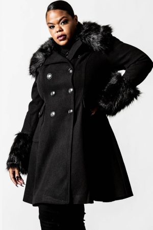 A Women Wearing Fur Collar Black Trench Coat