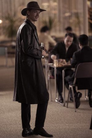 Thomas Brodie-Sangster Wearing Black Leather Coat In TV Series The Queen's Gambit as Benny Watts