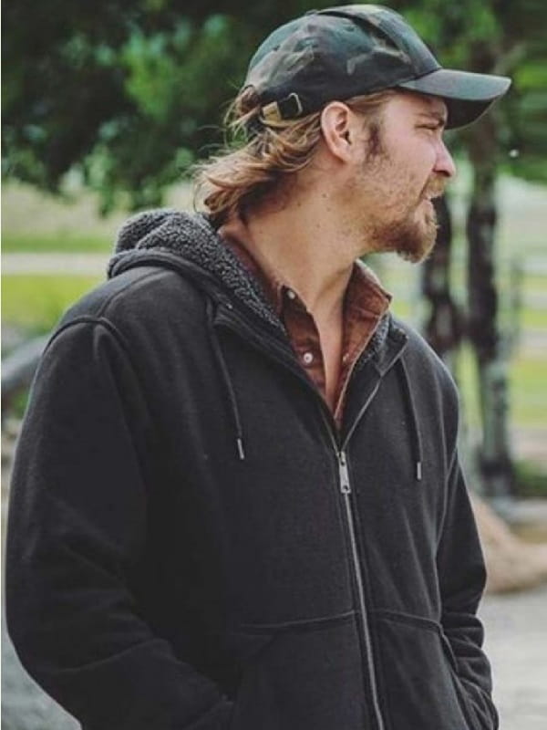 Actor Luke Grimes Wearing Black Hoodie Jacket In Yellowstone as Kayce Dutton